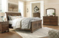 Flynnter King Panel Bed with 2 Storage Drawers with Mirrored Dresser, Chest and Nightstand